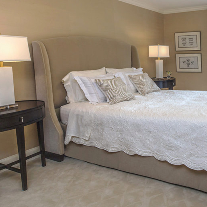 Guest bedroom with upholstered headboard